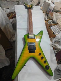 New custom grands guitar shop, iconic electric guitar with skull case, engraving, green circle yellow decoration