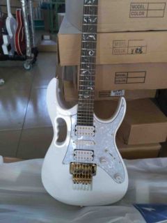 Custom Ibans electric guitar in snow white with vine fretboard inlays 21 to 24 frets deep scalloped guitar gold hardware