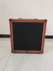 1*12 guitar speaker cabinet with Celestion V30 speaker in brown color