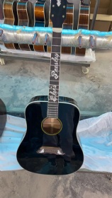 Custom Elvis Presley acoustic guitar and John Lennon